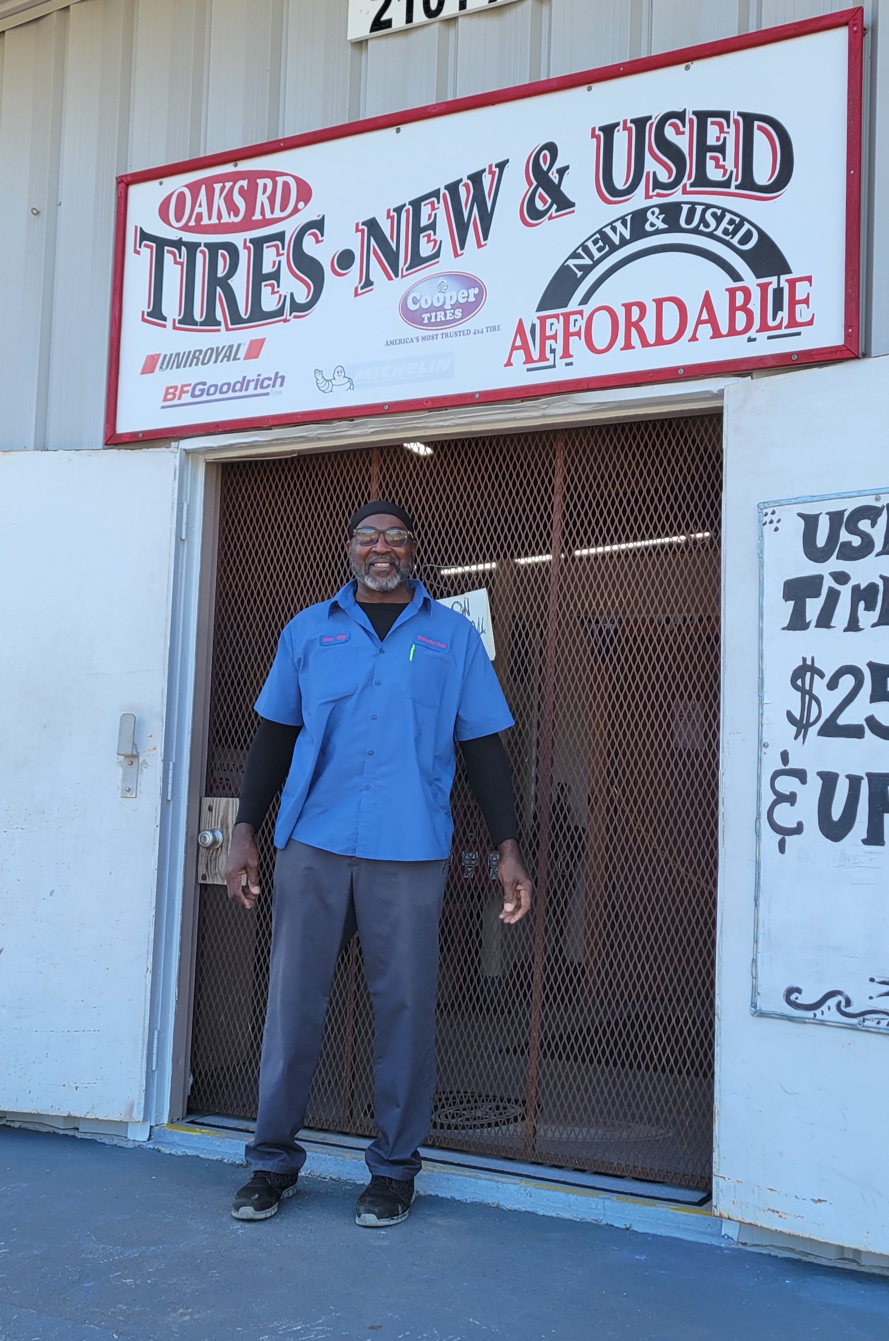 Jerry, in front of his business, Oaks Road Tires, in New Bern, NC.