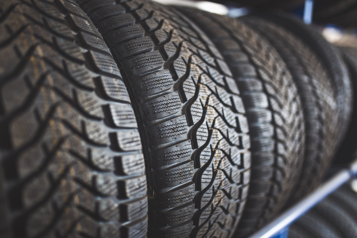 stock image of a rack of car tires